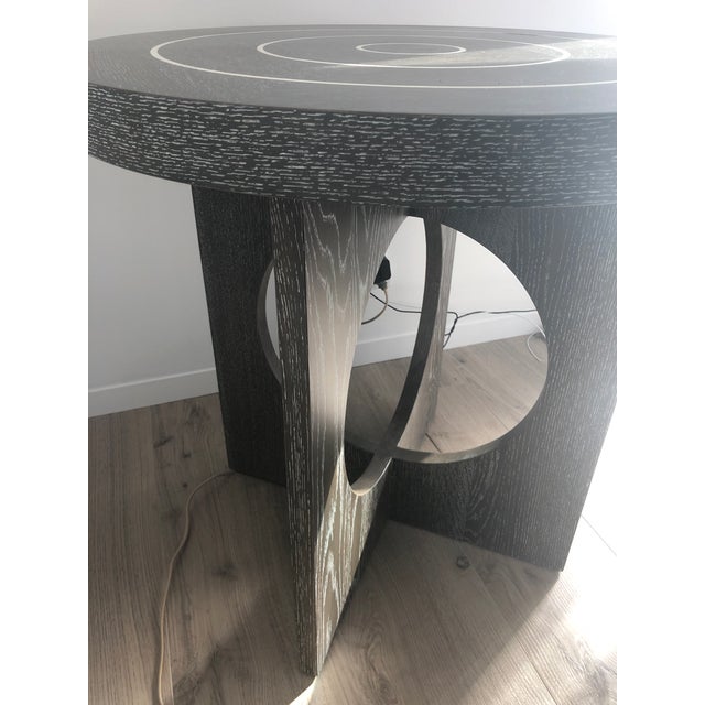 This is a custom-made rift oak wood table designed by Interior Designer, Lisa McDennon. The unique design and neutral...