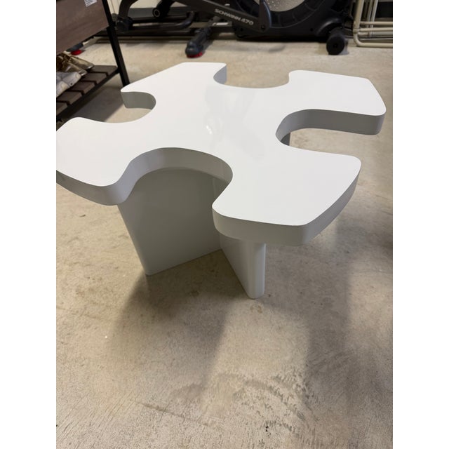 These are a one of a kind set of custom-built puzzle piece accent tables. Unlike mass-produced furniture, these were...