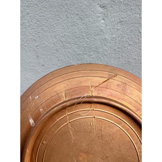 Wall Plate – Hand-Hammered Copper $285.00 A breathtaking hand-hammered copper wall plate with an organically crimped rim...