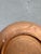 Wall Plate – Hand-Hammered Copper $285.00 A breathtaking hand-hammered copper wall plate with an organically crimped rim...