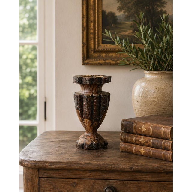A sculptural vintage vase hand carved from chrysanthemum wood, distinguished by its deeply ridged body, scalloped edges,...