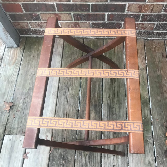 This is a beautiful and sturdy Italian style folding luggage rack made of wood and straps with a stylish Greek key design...