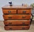This is a gorgeous Arts and Crafts 1910's pine chest of drawers, with exquisite features that would grace a vintage home...