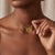 Celebrate fresh beginnings and the vibrant beauty of nature with this exquisite Marquise Peridot Butterfly Necklace. This...