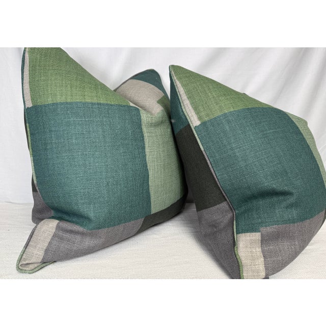 Custom pair of 22" pillows covered fronts and backs in same repeat of Peter Dunham "Collage" in color green/gray linen....