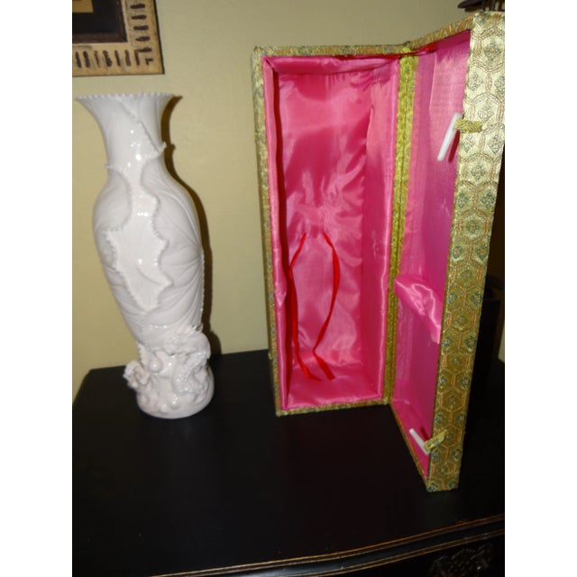 Chinese Porcelain Dragon Vases with storage cases. They feature lotus leaves and dragons. They are in excellent condition...