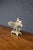 Ornate Victorian silver-plated tazza featuring a pierced figural framework with cherub figures, scrolling branches,...