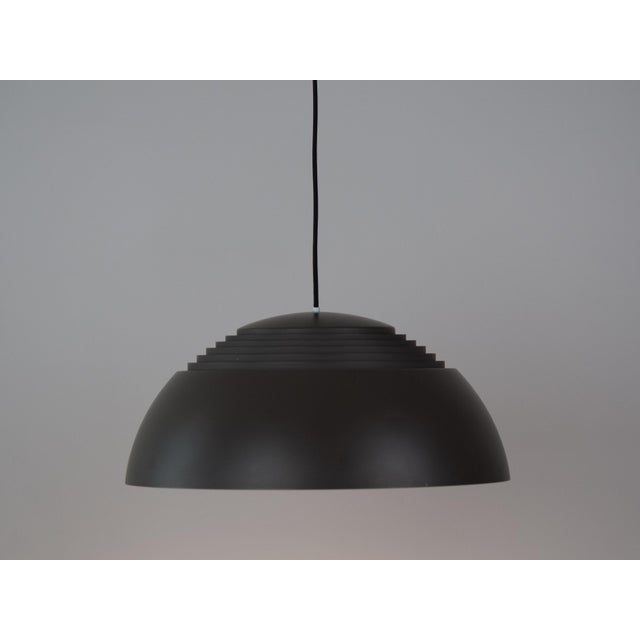 The aj royal 500 lamp is a timeless classic of danish design, designed by arne jacobsen in 1960 for the legendary sas...