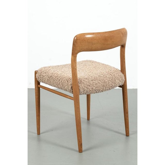 Niels møller chair model 75 in light oak edition and with new fake wool upholstery. In a good vintage condition....