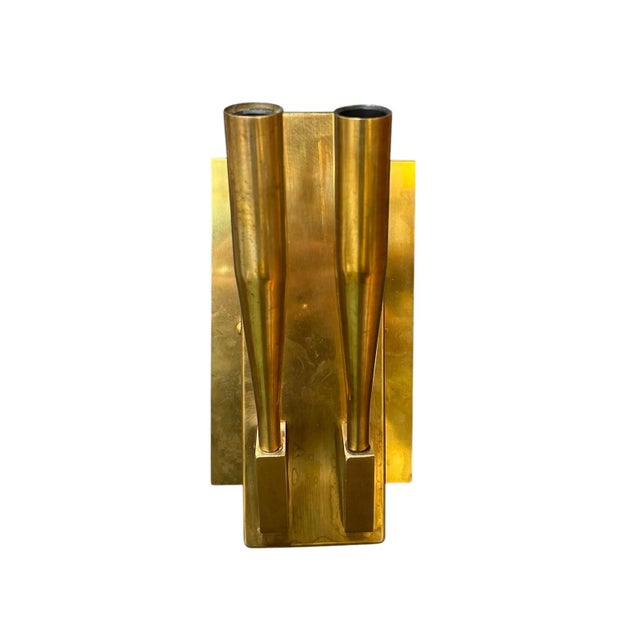 These exquisite pair of vintage Italian brass wall sconces by Gio Ponti feature twin tubular arms mounted on a bold brass...