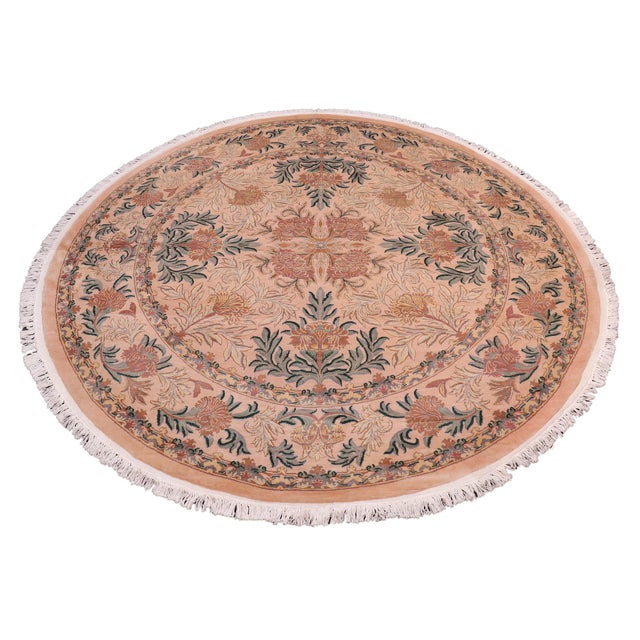 This hand‑knotted Pak Persian round rug showcases the finest expression of traditional Persian artistry. Each piece is...