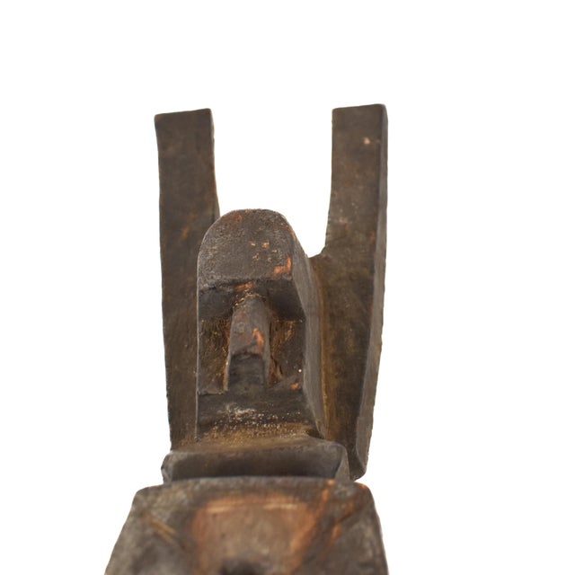 The Dogon Door Lock from the Dogon tribe in Mali is a classic piece showcasing signs of extensive use. Crafted from two...