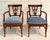 Here is an elegant set of six neoclassical dining chairs from the late 20th century, defined by beautifully carved backs...