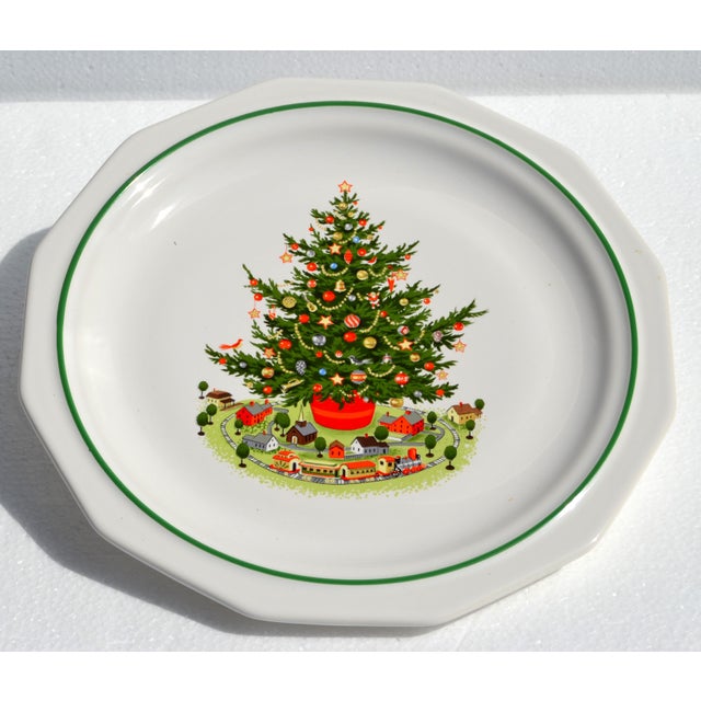 The Pfaltzgraff Christmas Heritage Dinner Plate is a festive 10–10.25 inch stoneware plate featuring a traditional...