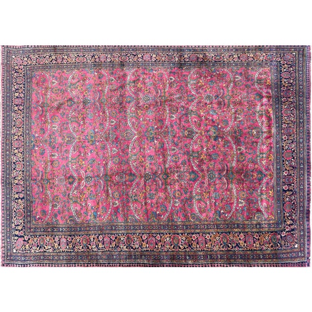 Indulge in the timeless elegance of our Antique Handmade Northwest Persian Sarouk Mohajeran Rug the most unusual, a...