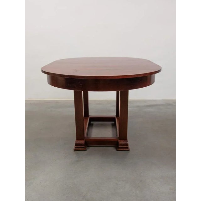 Very rare dining room table in solid wood sleek and sober designed by Jac Van den Bosch for 't Binnenhuis Amsterdamse...