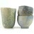 A set of three sculptural decorative mugs made of ceramic decorated with underglaze crayons. The surface is additionally...