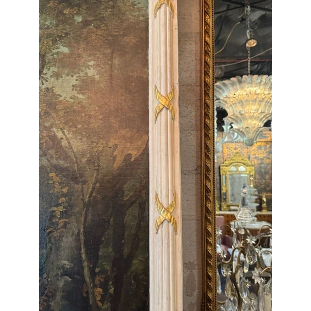 The product is a pair of large-scale Italian oil on canvas paintings depicting river scenes. These paintings are likely to...