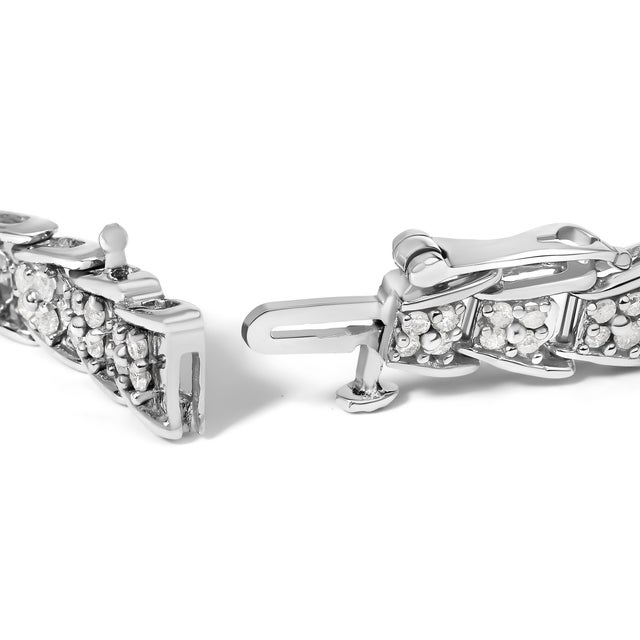 STUNNINGLY UNIQUE – What sets this sterling silver bracelet apart is the way each intricately detailed link fans out for a...