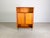 One of two beautiful vintage cabinets from the 1960s/1970s. The piece features two large doors and two open compartments...