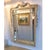 Louis XVI–Style Painted Trumeau Mirror with Tassel Detail Elegant Louis XVI–style trumeau mirror featuring a refined...