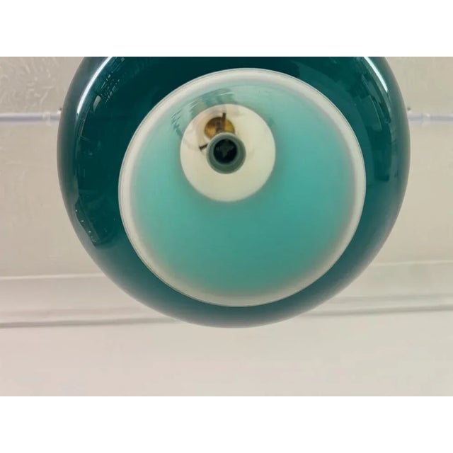 Ceiling pendant White glass cone Green glass shade Brass fittings Italy 1960s Up to 250V (Europe/UK Standard).The wiring...