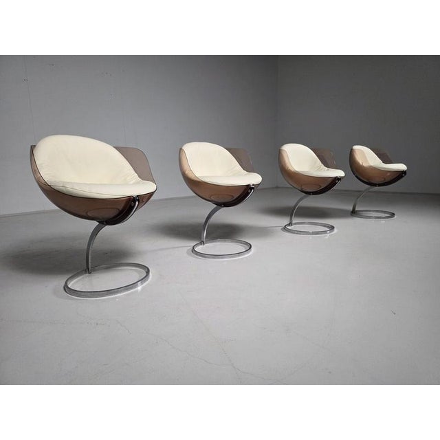 Set of four “Sphère” dining chairs designed by Boris Tabacoff and manufactured by Mobilier Modulaire Moderne (MMM),...