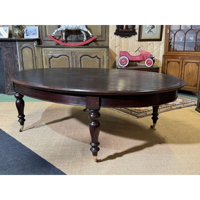 Large English library table in dark walnut with a leather top - early 20th century - L=2.45m W=1.80m H=78cm Height under...