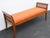 This charming Bench is made of wood, caning, and upholstery. This lovely Bench has Mid century style, it features a...