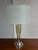 Design Plus Gallery presents the Gable Glass Table Lamp from Bassett Furniture. The reflective glass body displays smoky...