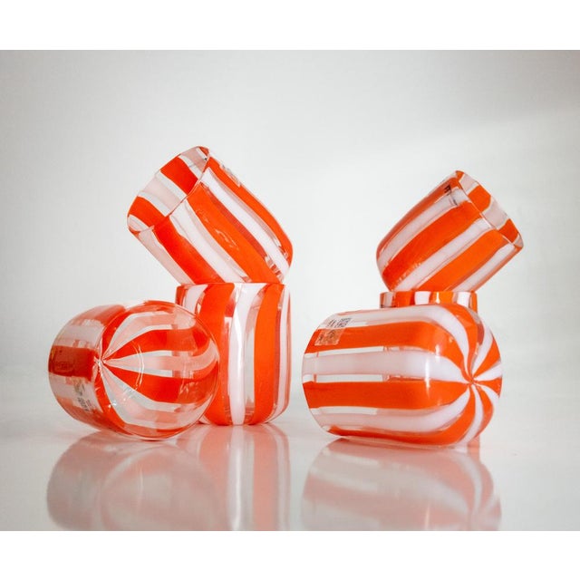 Enchanting set of glasses produced by the prestigious Nicola Moretti glassworks in Murano for Ribes the Art of Glass. They...