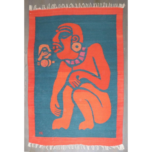 Hand-dyed wool on cotton warp; A bold and expressive handwoven wool tapestry from the Zapotec weaving tradition of...