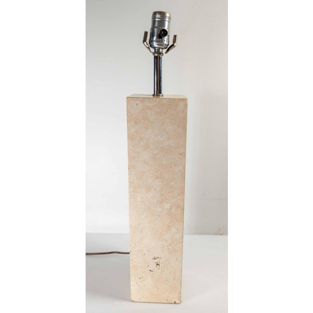 We are selling this great simple mid-century modern Travertine table lamp.. This table lamp is probably Italian in origin...