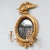 American gilt carved wood girandole mirror with flanking eagles on rock plinths perched to flee , upper and lower acanthus...