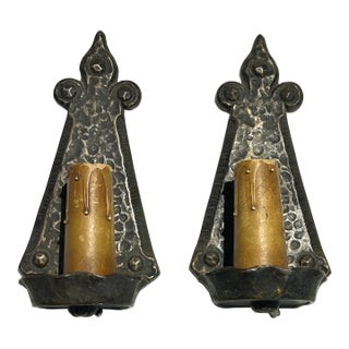 Pair of Antique c.1920’s Art’s & Crafts / Spanish Revival Hammered Iron With Fleur-De-Lis Motif Wall Sconces With Original Candle Sleeve Socket Covers For Sale