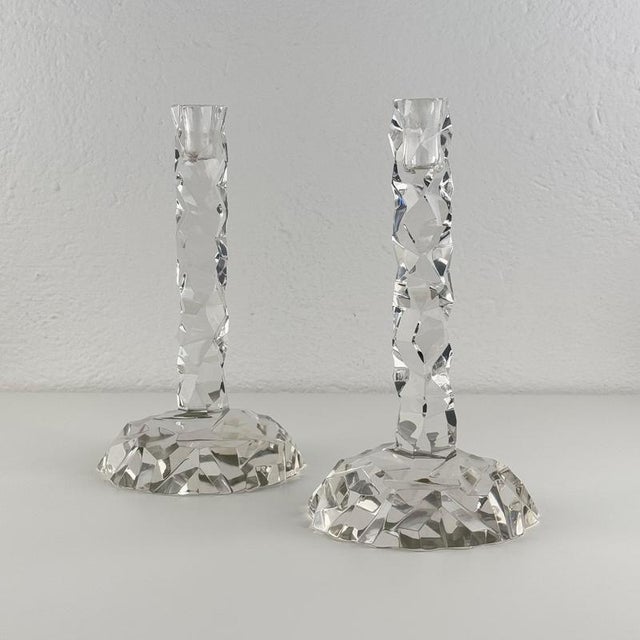 An extraordinary pair of sculptural Murano glass candlesticks by Archimede Seguso, dating to the 1950s. Signed on the...