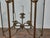 This large French iron lantern from circa 1900 showcases a graceful architectural form crafted from riveted iron with...