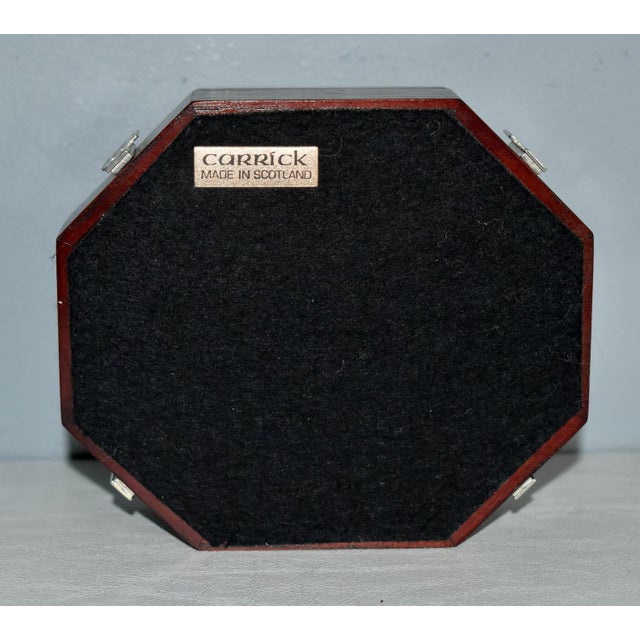 Vintage (1980's) Octagon Box made by Carrick. The Wood is Oak. Dark Brown Finish. with a Celtic Design. The Measurements:...