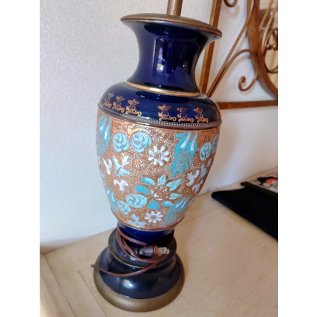 Gorgeous and rare Slater Art Neauveau lamp with gold overlay on porcelain and enamel.