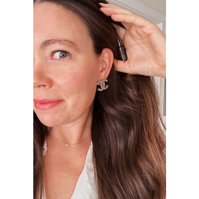 What Makes This Pair Special Rhinestones and pearls come together in an airy cutout design for a sleek, modern look....
