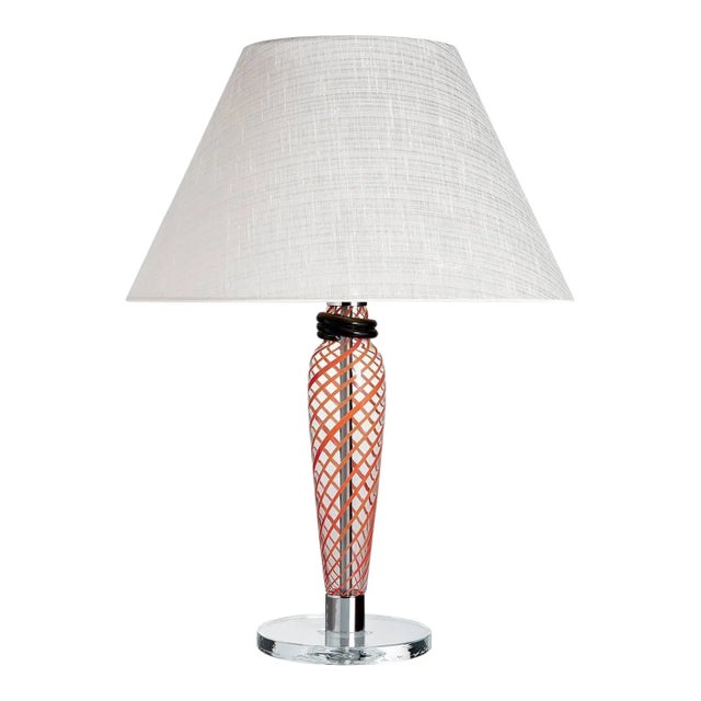 Table lamp with Murano glass column, black/red transparent glass base, truncated cone-shaped fabric shade, and metal...