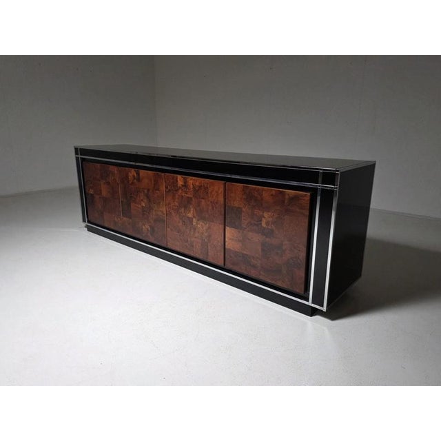 An elegant and substantial Italian sideboard produced by Mario Sabot in the 1970s. The design combines a high-gloss black...