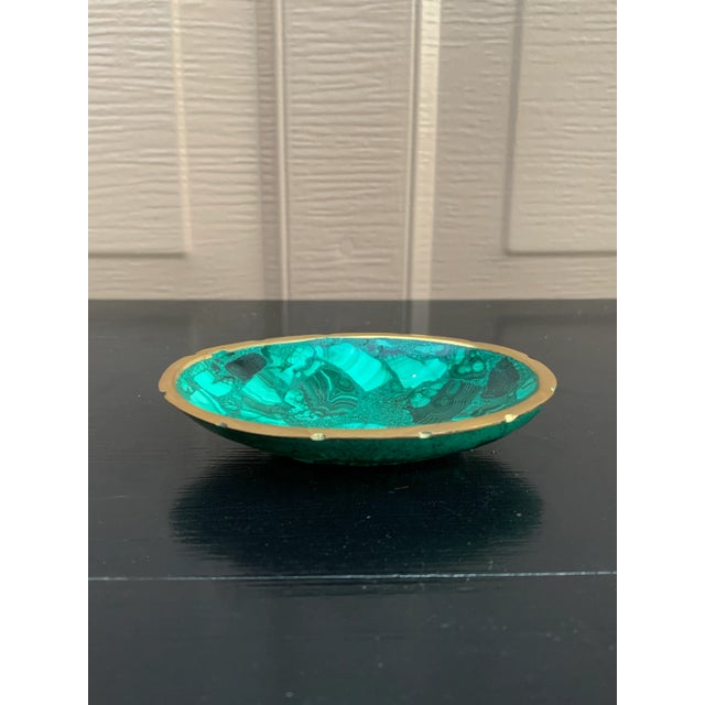 A stunning Russian style malachite bowl with brass trim Late 20th century Measures: 4.25"W x 3.13"D x 0.75"H. Very good...