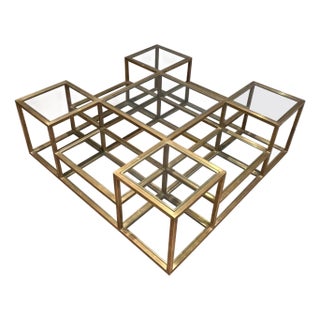 Large, multi-tiered brass coffee table. French work. Circa 1970 For Sale