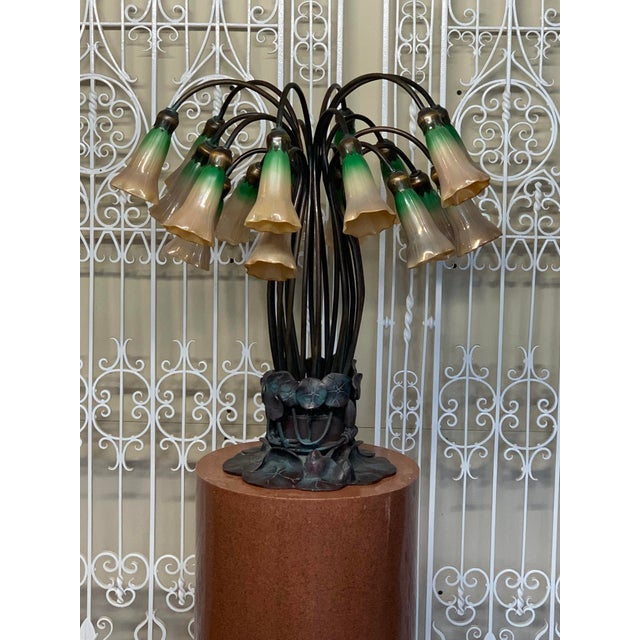 Bring classic Art Nouveau elegance into your home with this stunning 18-light Tiffany-style lily lamp. Inspired by Louis...