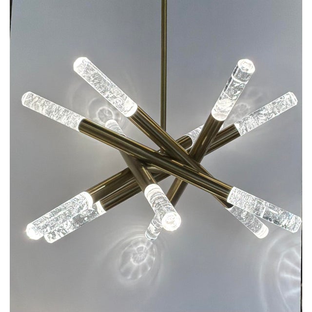 Original retail $3795, stylish Revelation Modern Brass and Quartz LED Scepter Pendant, showroom floor sample