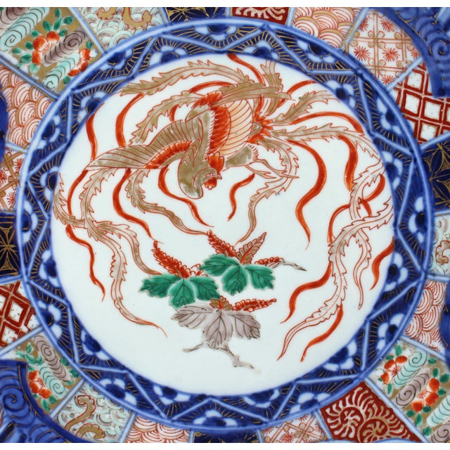 Circa 1870 large scalloped Imari charger, Japan. Heavy aesthetic movement influence in the 21 scalloped panels. Fantastic...