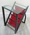 Mid-Century Modern Glass Top End Table Waterfall Magazine Rack circa 1970s This stylish end table is fashioned in a modern...