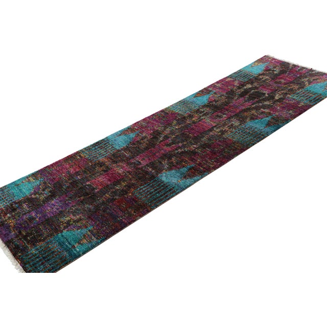 Made with hand-knotted sari silk, this 2x8 contemporary runner rug from our Modern Classics collection is particularly...