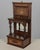 A 19th century English Edwardian vitrine constructed using rich, finely grained rosewood with contrasting satinwood...